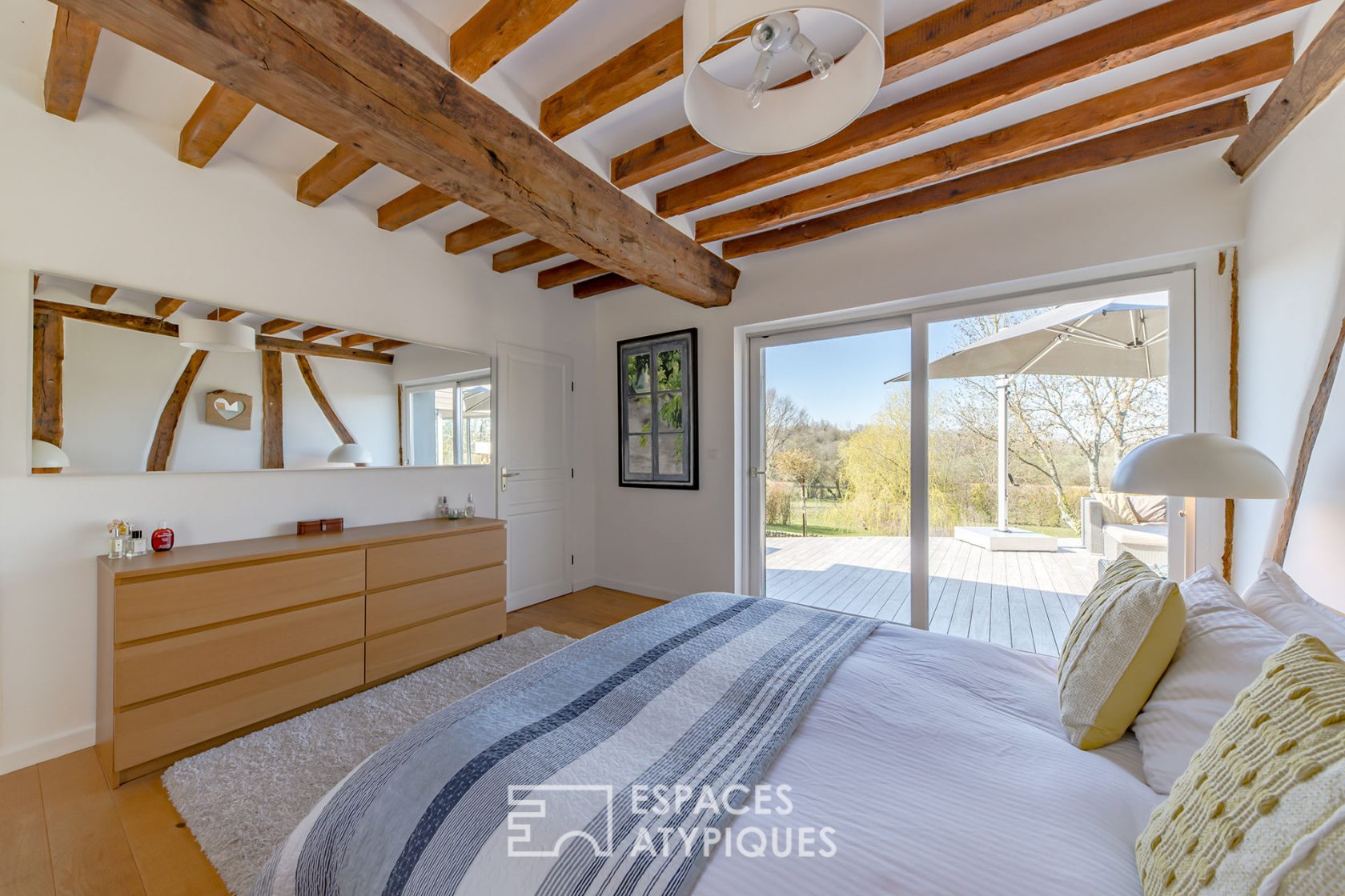 Revisited farmhouse with architect’s extension and view of the Normandy countryside