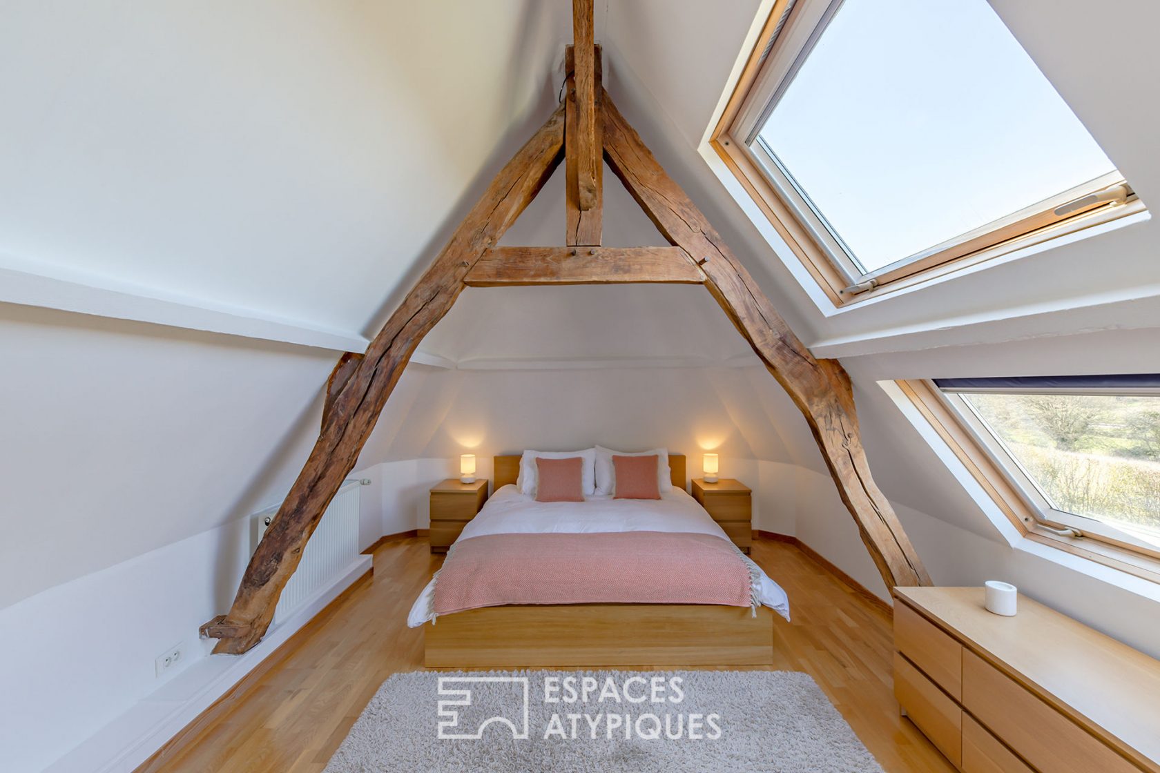 Revisited farmhouse with architect’s extension and view of the Normandy countryside