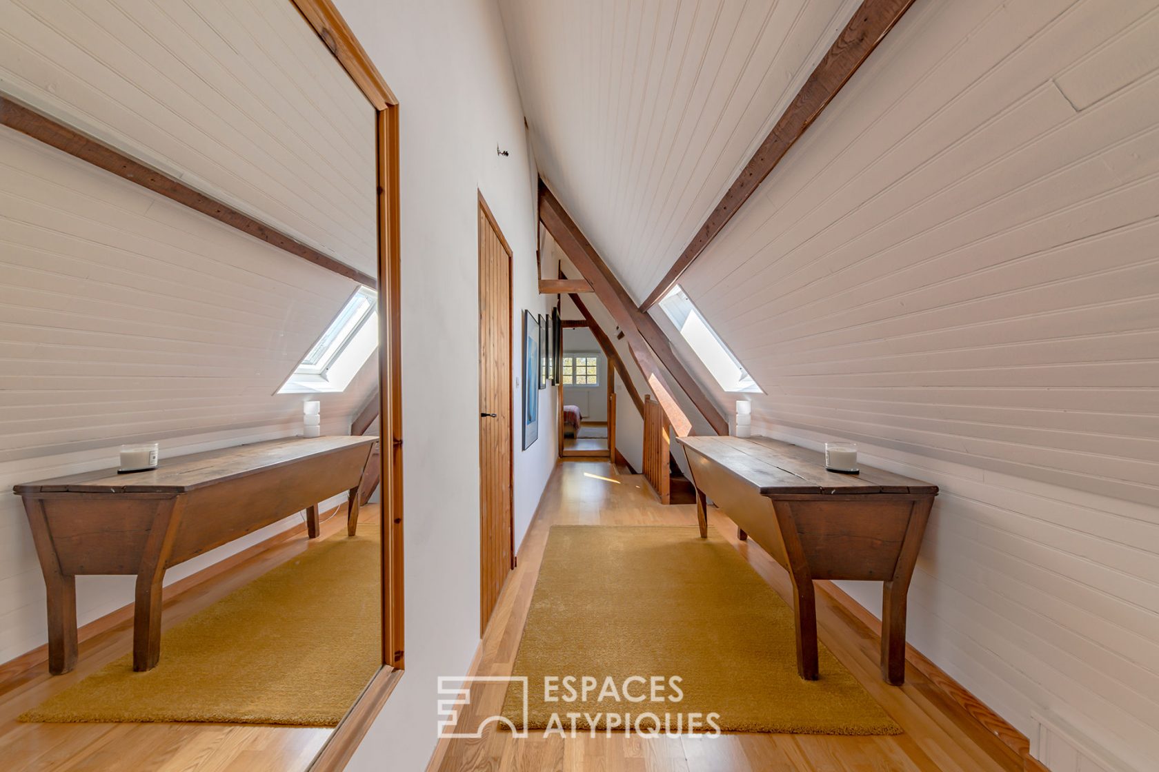 Revisited farmhouse with architect’s extension and view of the Normandy countryside
