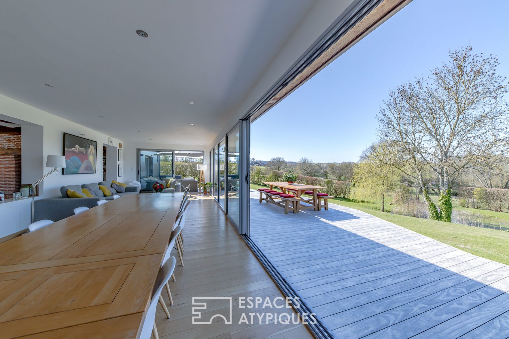 Revisited farmhouse with architect’s extension and view of the Normandy countryside
