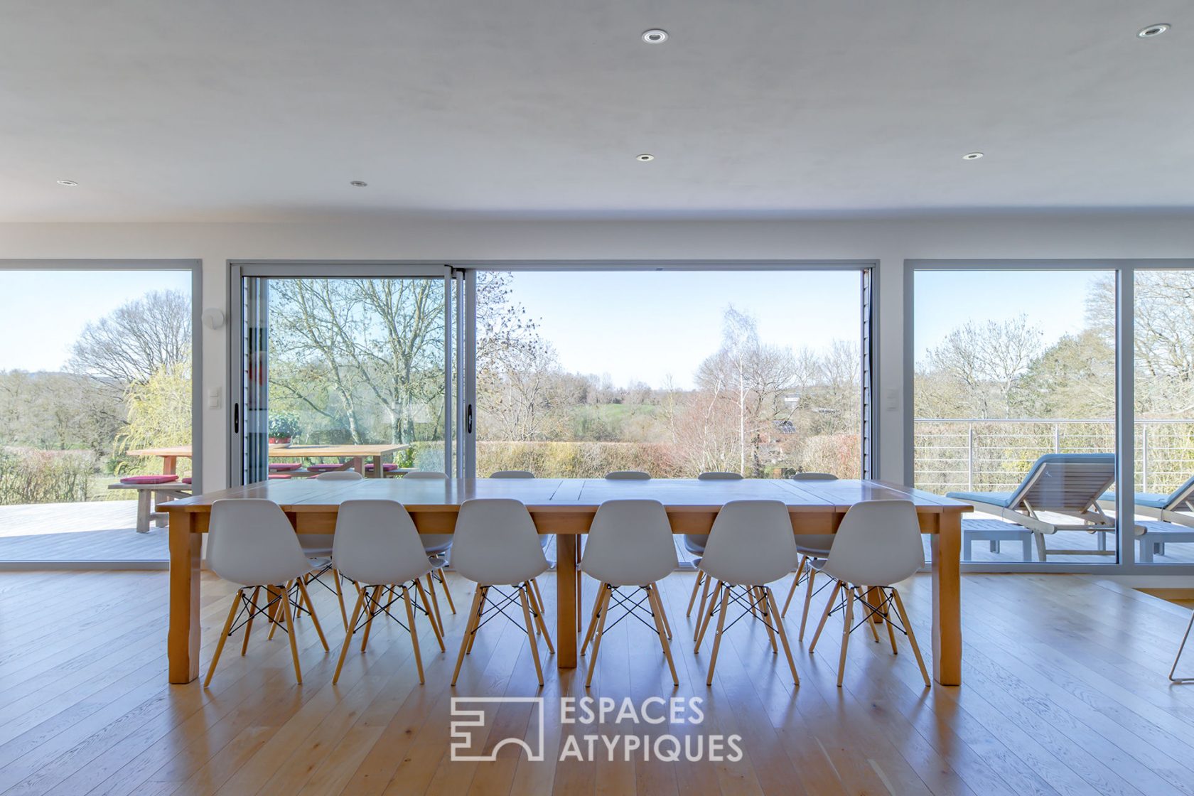 Revisited farmhouse with architect’s extension and view of the Normandy countryside