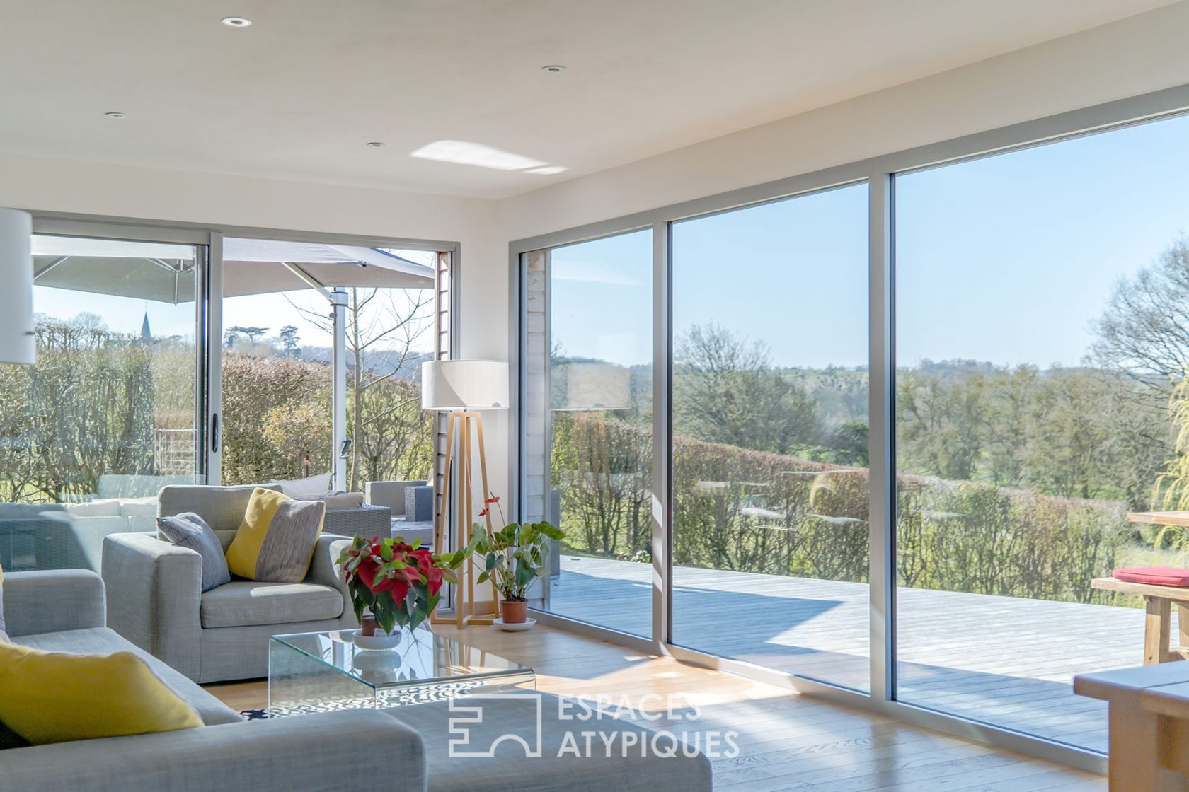 Revisited farmhouse with architect’s extension and view of the Normandy countryside