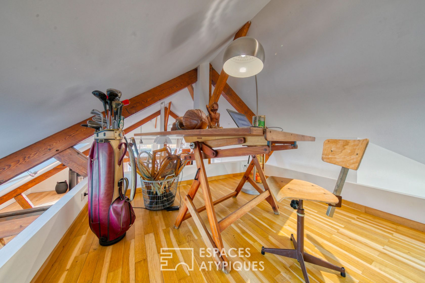 Contemporary loft under the eaves of an old port building
