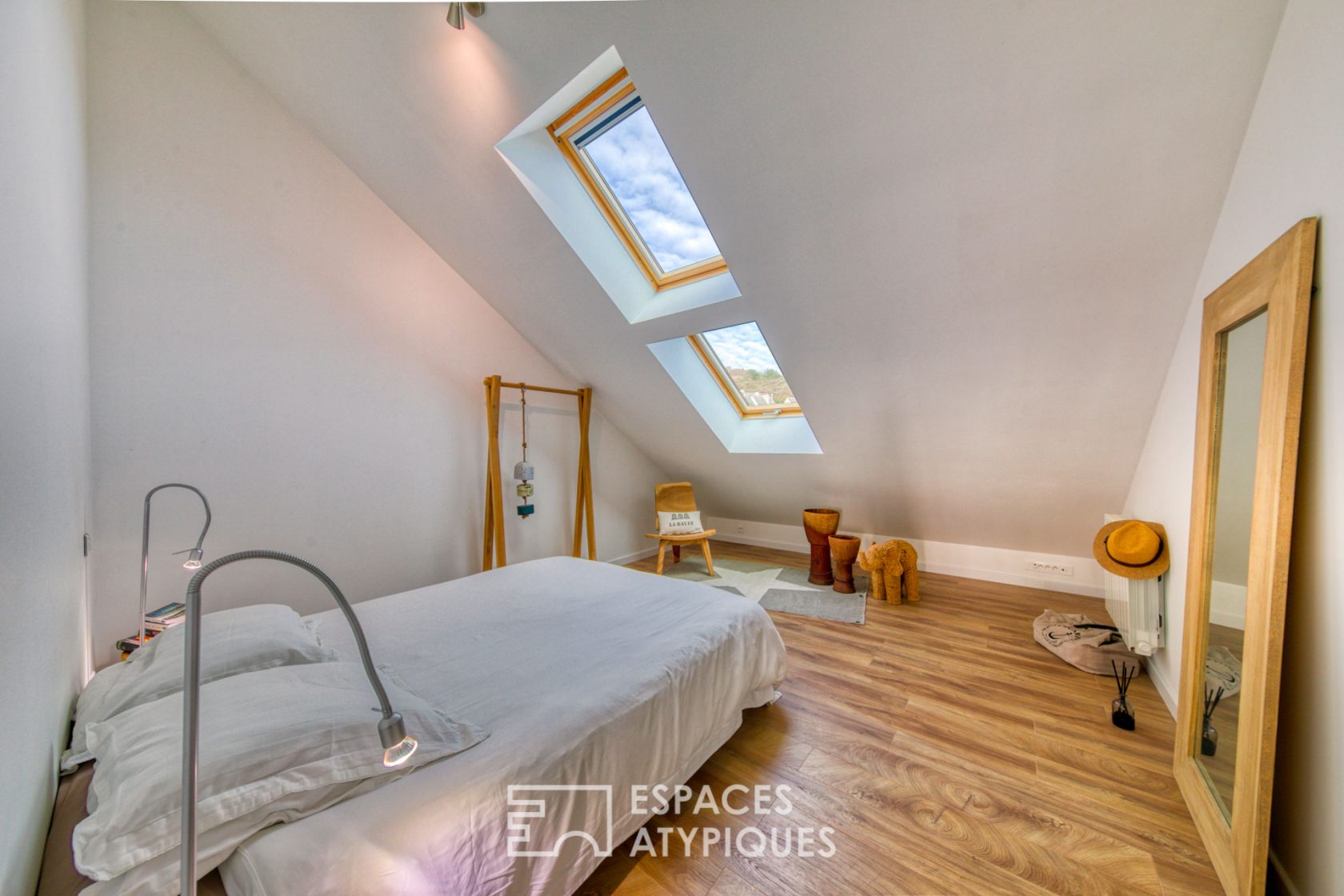 Contemporary loft under the eaves of an old port building
