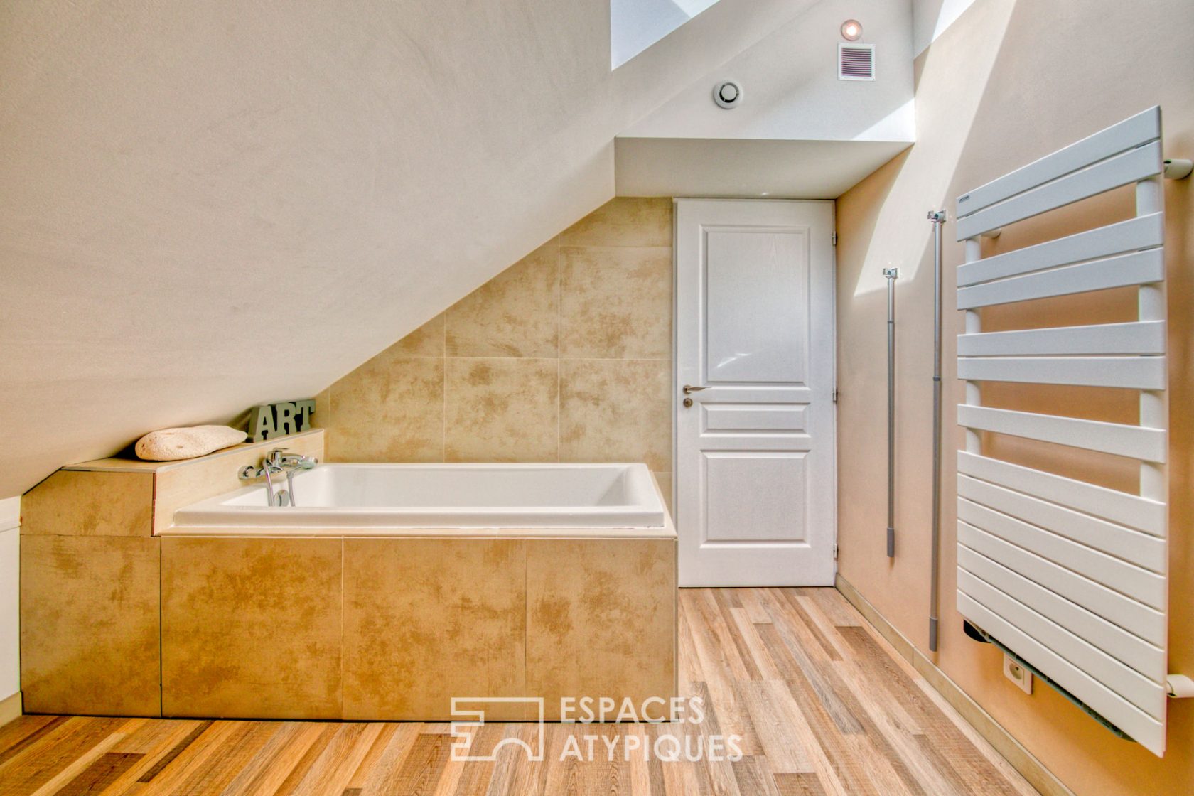 Contemporary loft under the eaves of an old port building