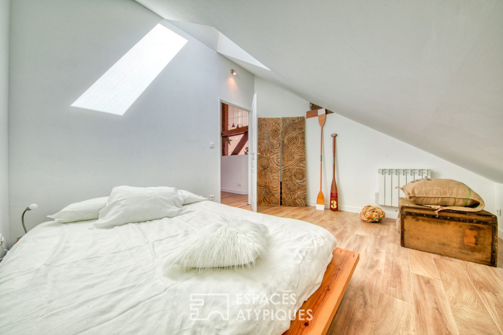 Contemporary loft under the eaves of an old port building