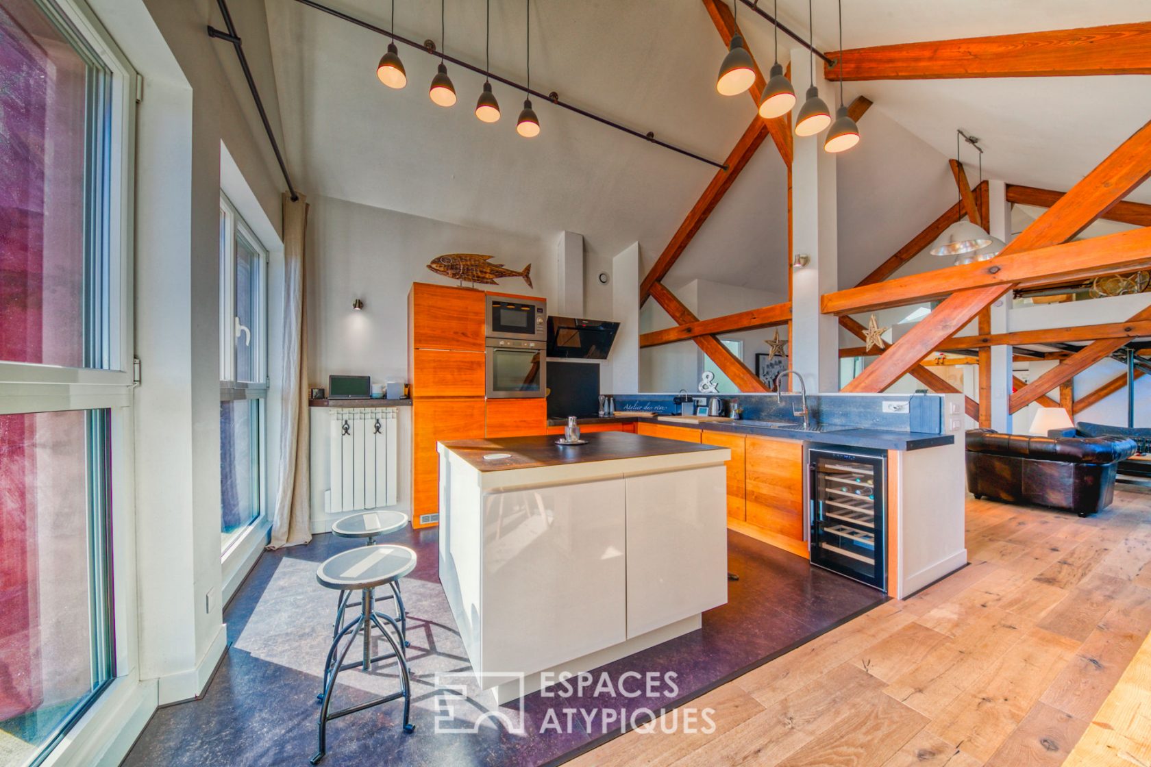 Contemporary loft under the eaves of an old port building