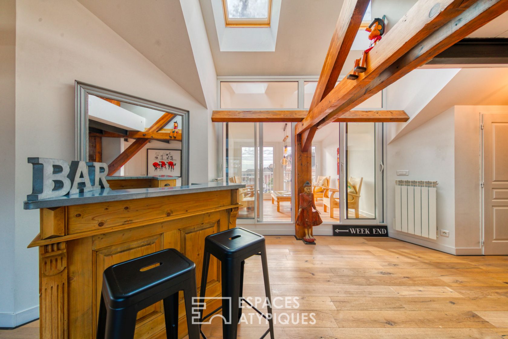 Contemporary loft under the eaves of an old port building
