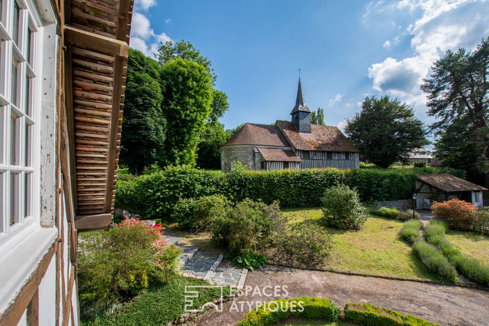 Character house with swimming pool in a charming village