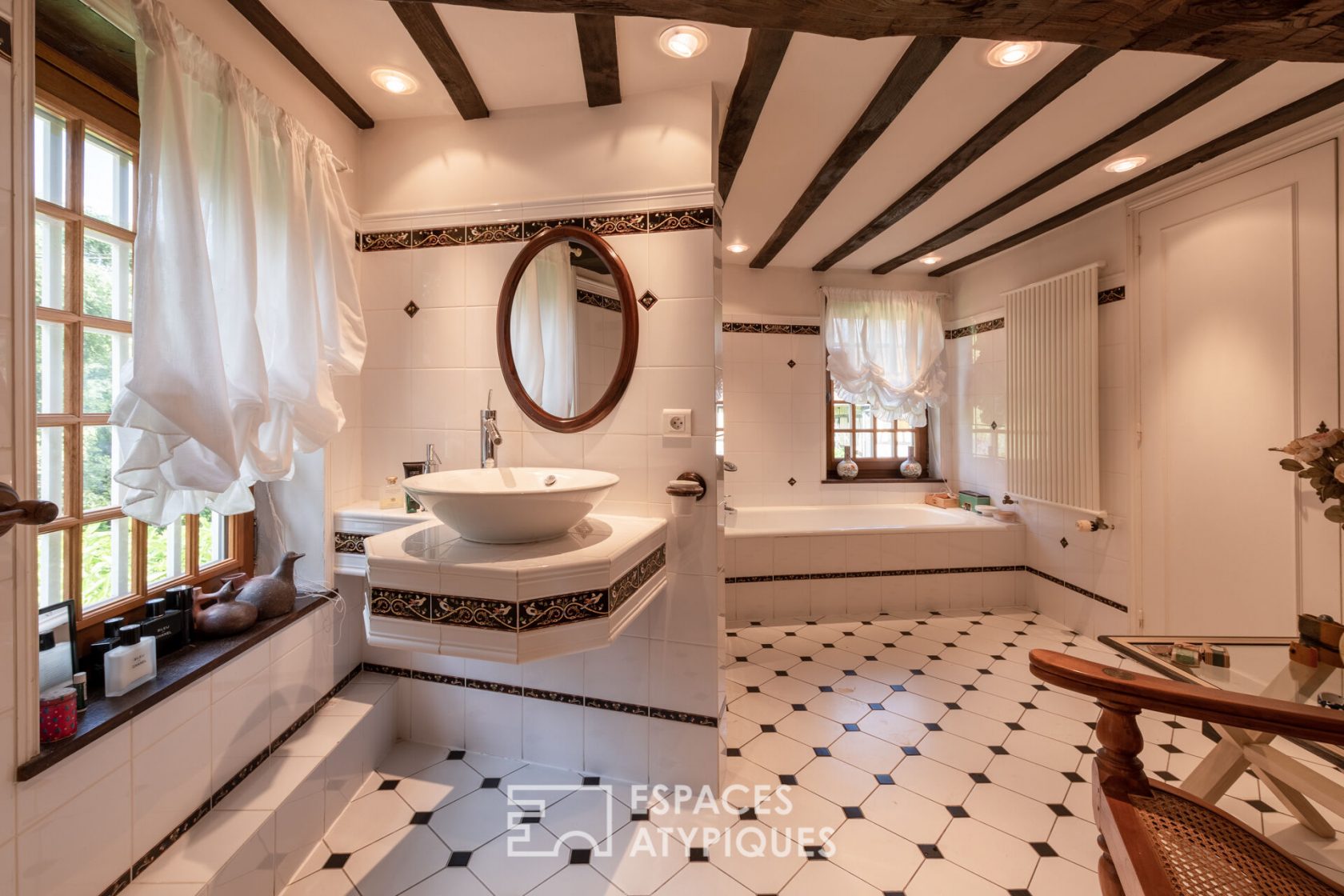 Character house with swimming pool in a charming village