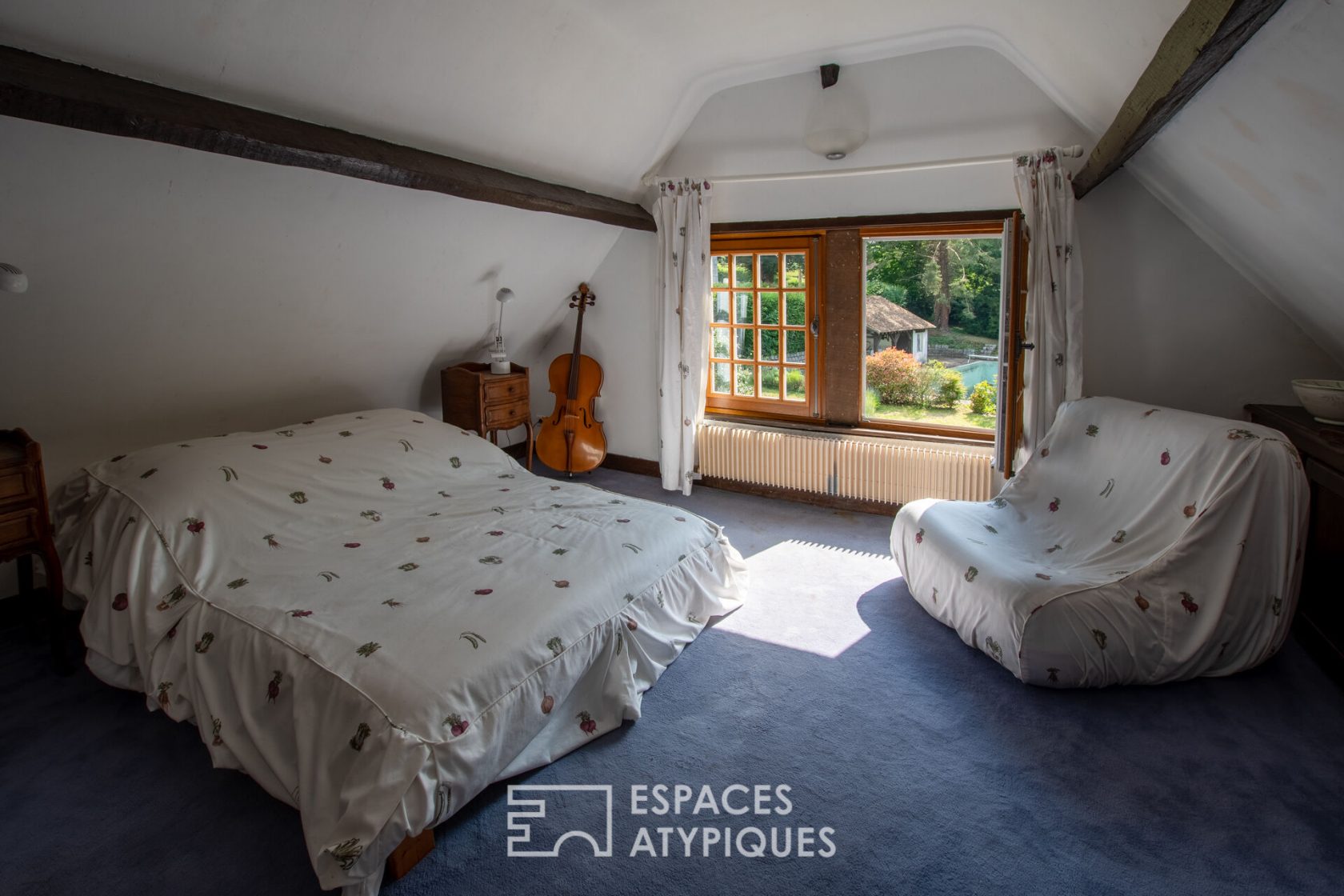 Character house with swimming pool in a charming village