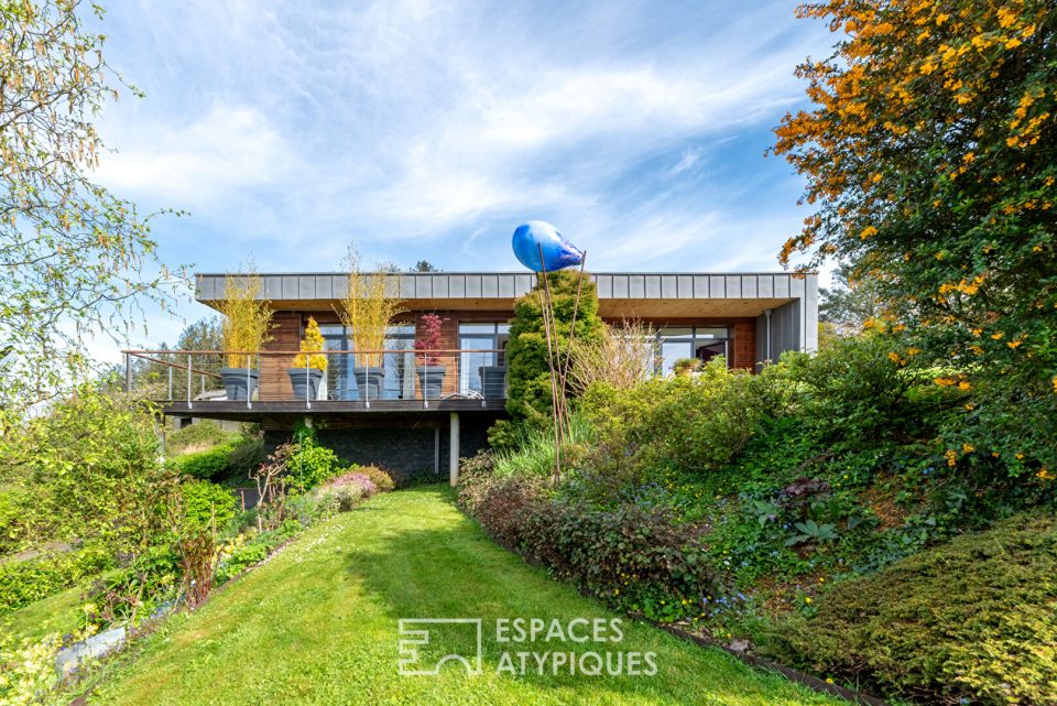 Maison d'architecte dans un cadre verdoyant avec vue sur la campagne