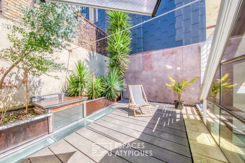 Conceptual loft with planted terrace and independent studio