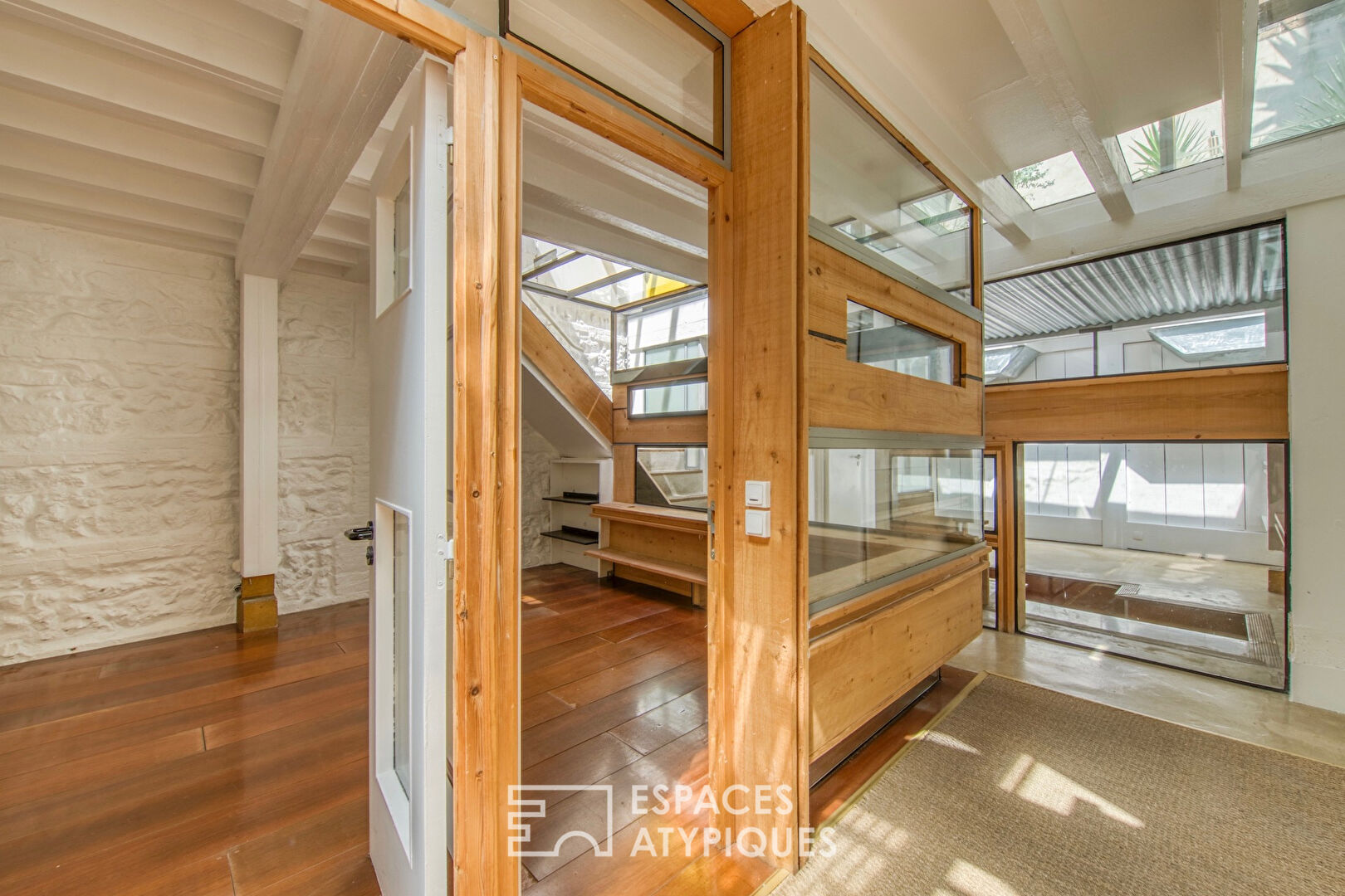 Conceptual loft with planted terrace and independent studio