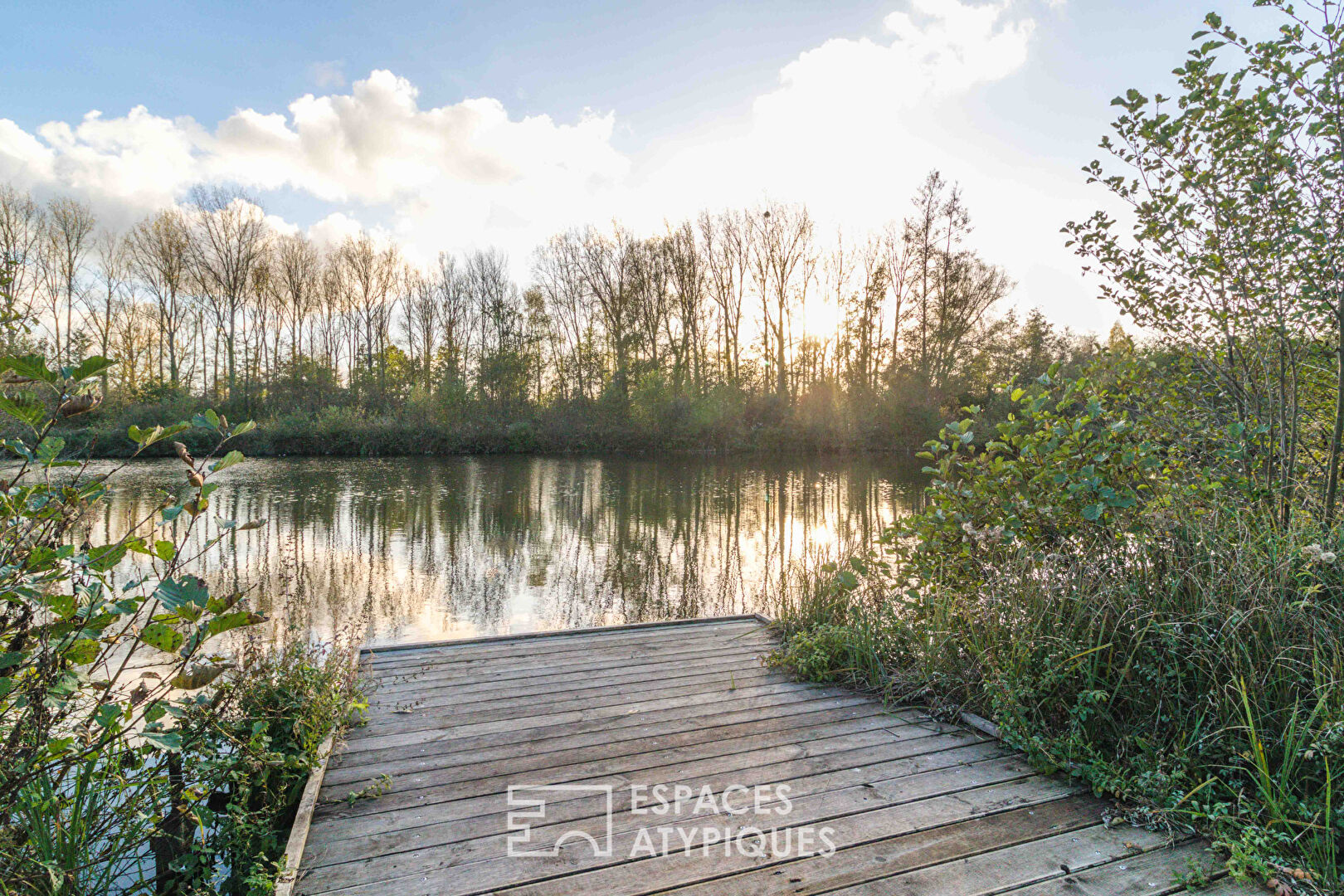 The Butterfly House-Le Corbusier in nature House and its pond – waterfront