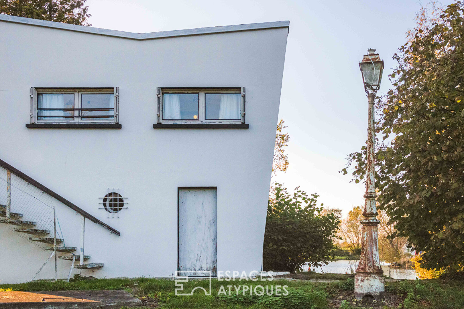 The Butterfly House-Le Corbusier in nature House and its pond – waterfront