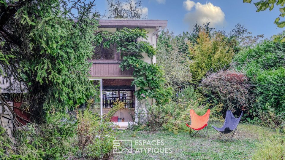 Maison d'architecte 1970 avec 5 chambres, joli jardin et garage