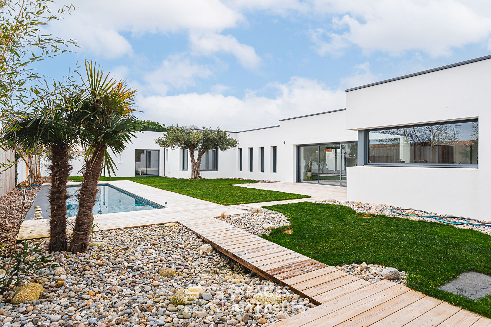 Contemporary enclosure in the heart of a coastal village