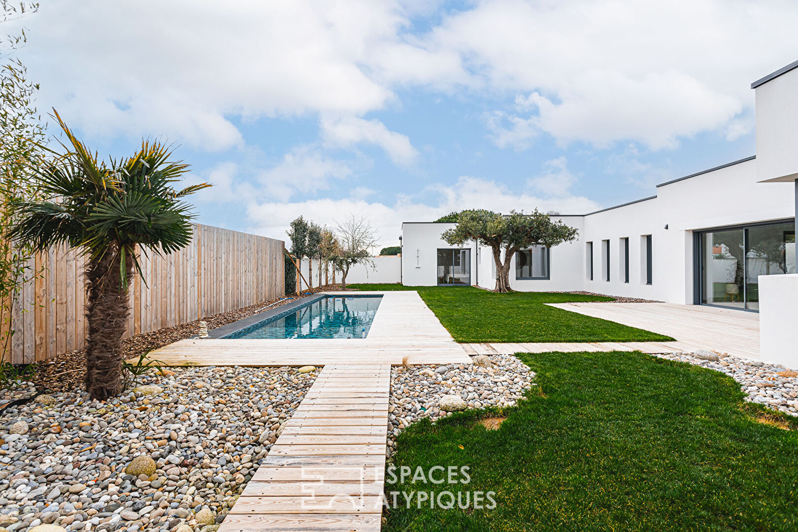 Contemporary enclosure in the heart of a coastal village