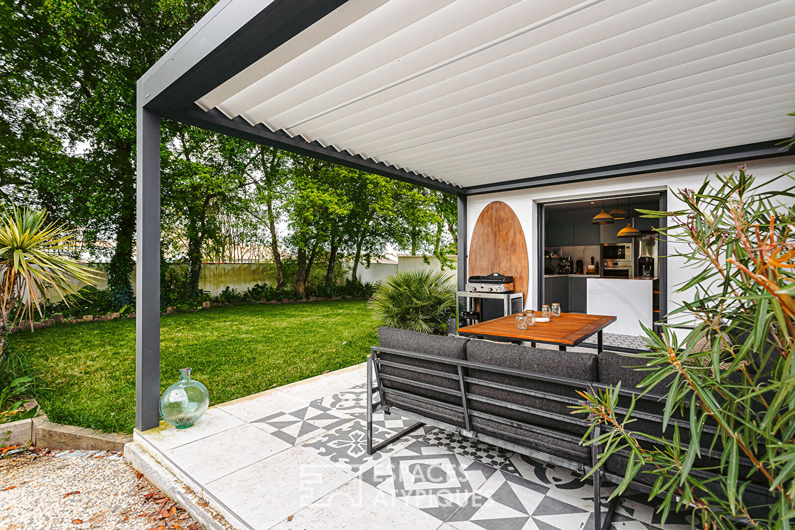 Charmante maison dans son écrin de verdure