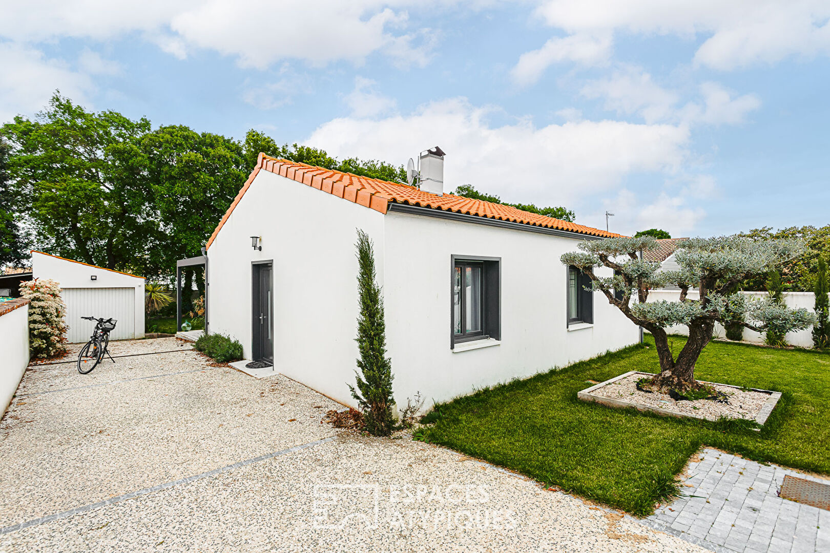 Charmante maison dans son écrin de verdure