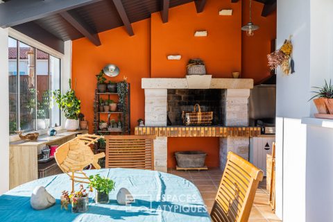 A bright, hidden hideaway in the heart of the city with a tree-filled garden and swimming pool