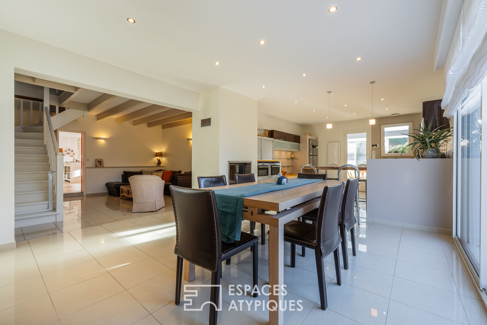 A bright, hidden hideaway in the heart of the city with a tree-filled garden and swimming pool