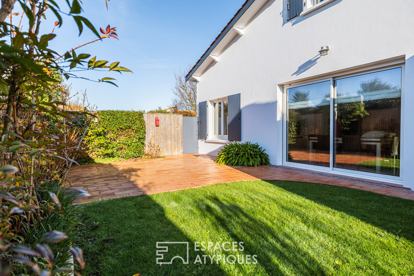 A bright, hidden hideaway in the heart of the city with a tree-filled garden and swimming pool
