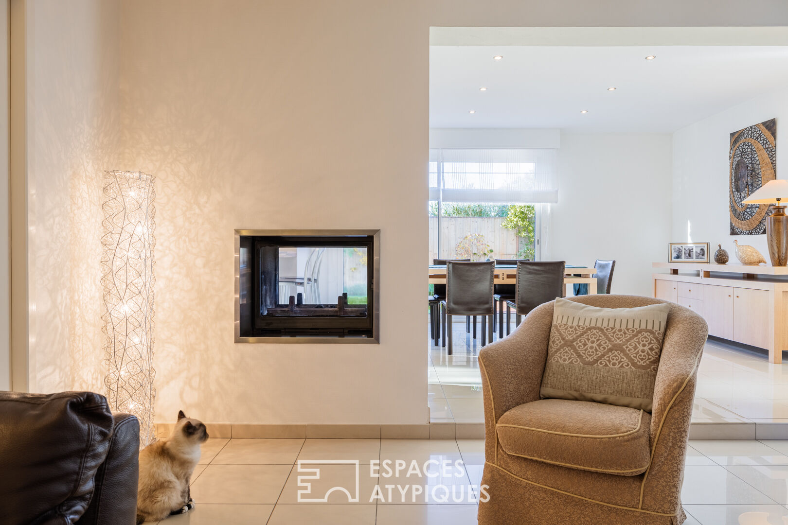 A bright, hidden hideaway in the heart of the city with a tree-filled garden and swimming pool