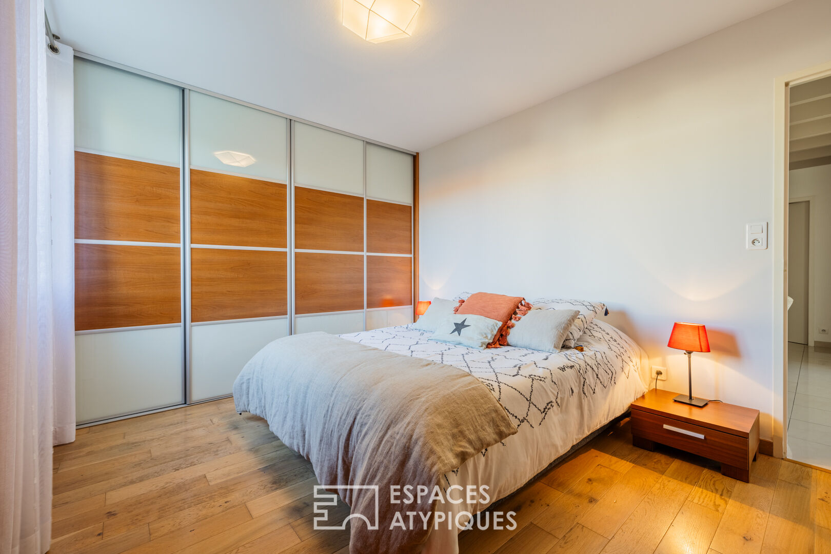 A bright, hidden hideaway in the heart of the city with a tree-filled garden and swimming pool