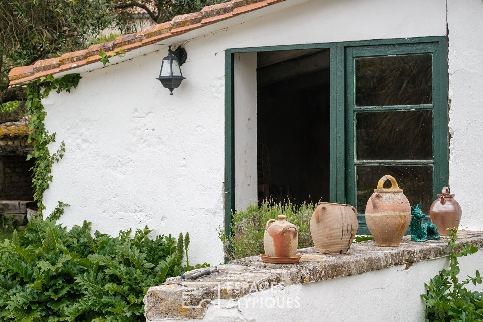 Charme et potentiel pour cette ancienne ferme au coeur du village
