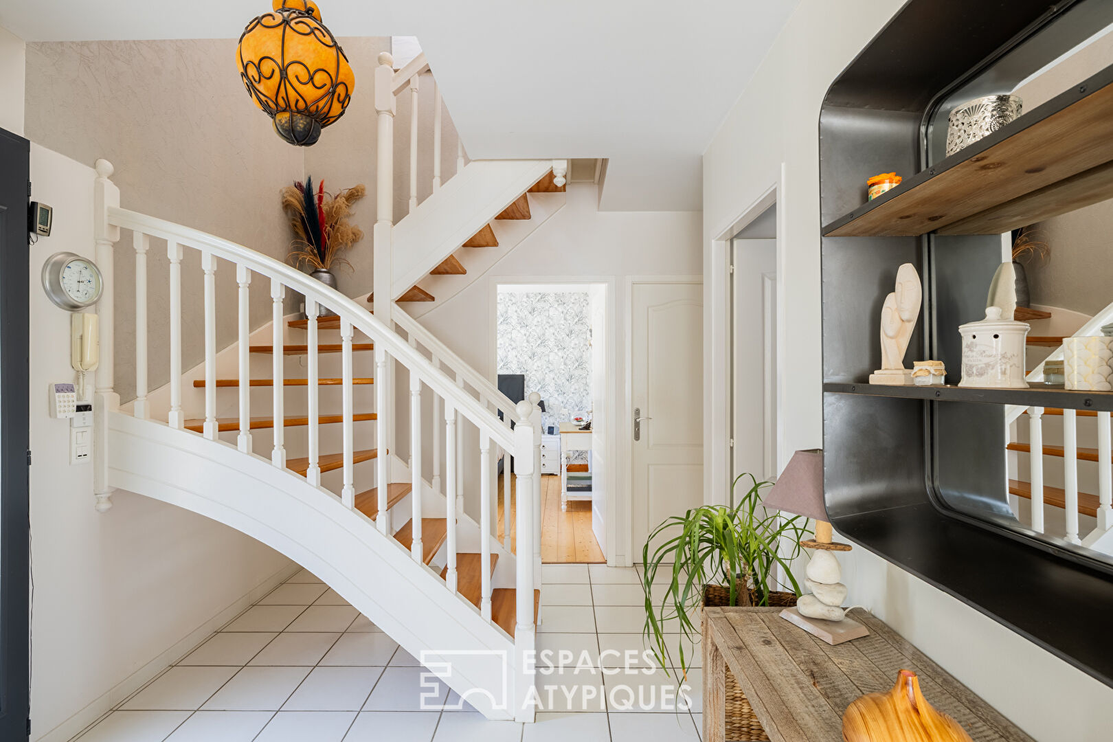 Maison familiale au coeur d’un jardin paysagé