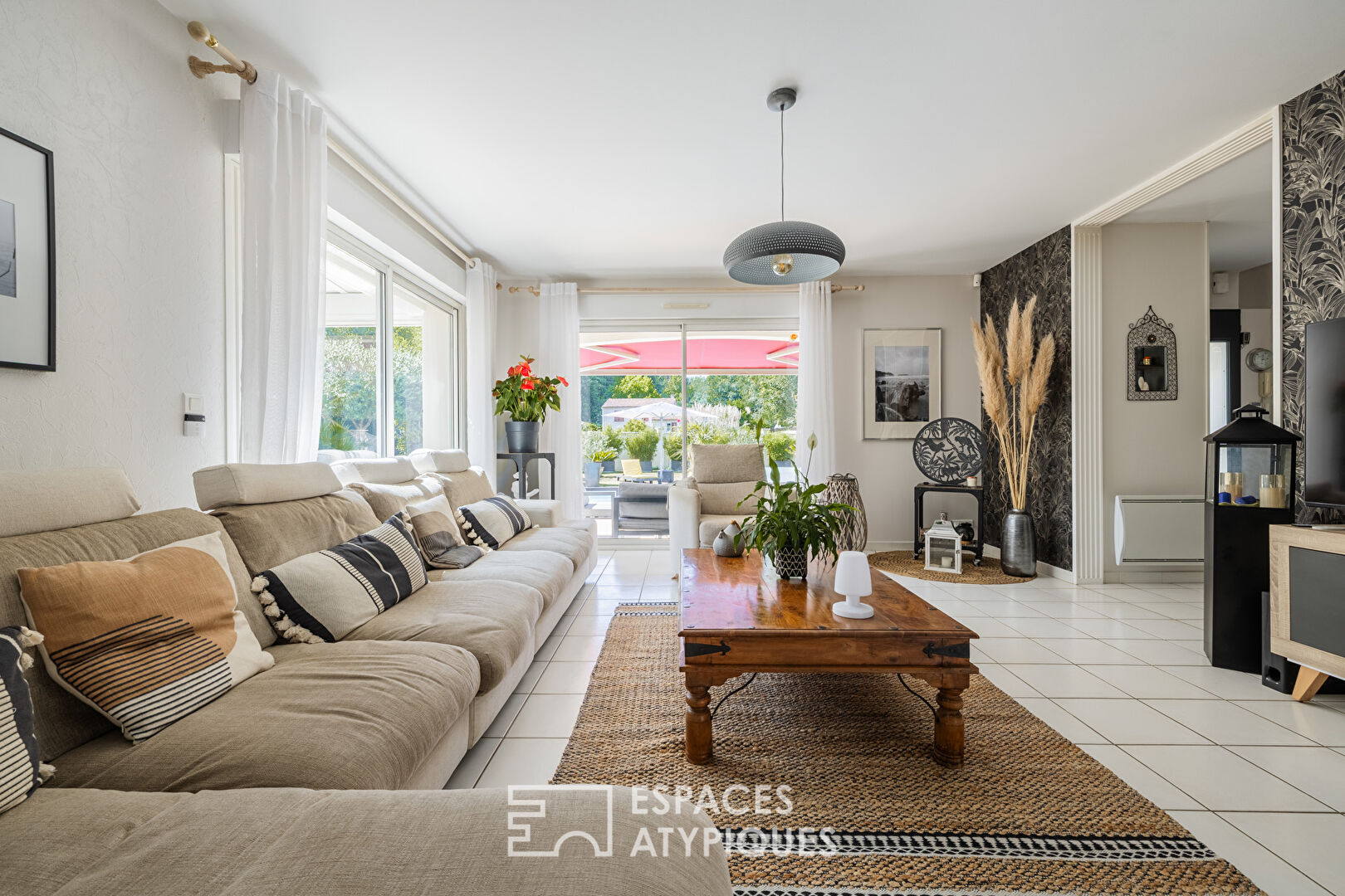 Maison familiale au coeur d’un jardin paysagé