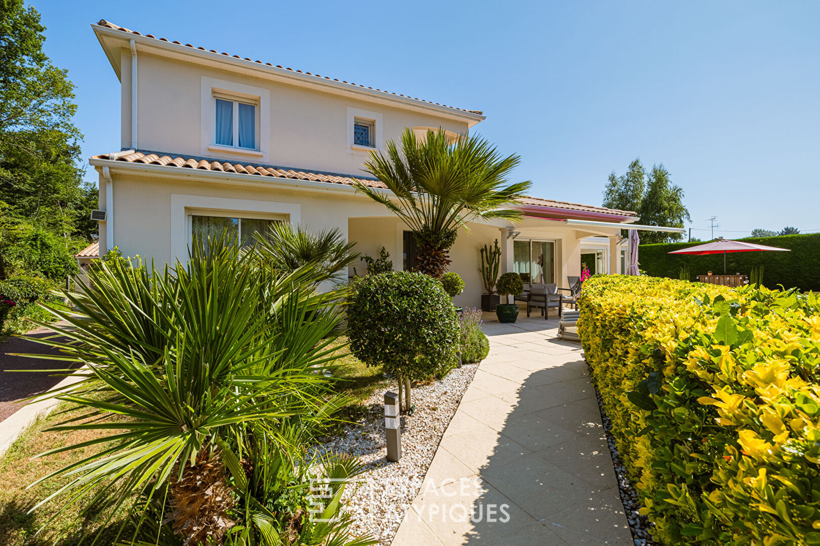 Maison familiale au coeur d’un jardin paysagé