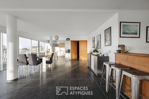 Penthouse lumineux à la vue panoramique et son garage XXL