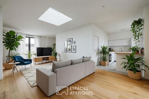 Appartement contemporain au dernier étage baigné de lumière près du Marché Central