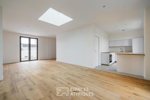 Appartement contemporain au dernier étage baigné de lumière près du Marché Central