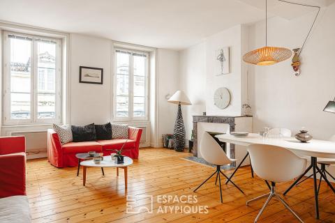 Luminosité et vastes volumes pour cet appartement de charme