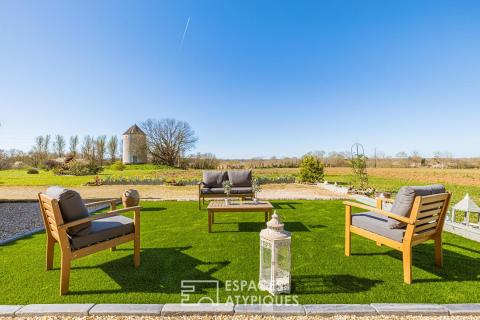 Charentaise de caractère aux espaces généreux et multiples possibilités