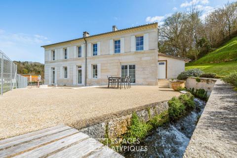 Ancien moulin à farine du XVIIe siècle dans son écrin naturel