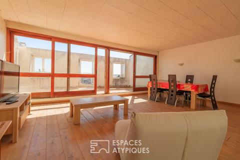 Appartement-terrasse à rénover avec sa vue sur les tours