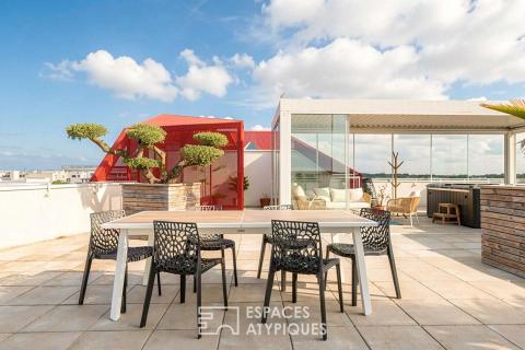 Prendre de la hauteur : appartement contemporain et son rooftop suspendu