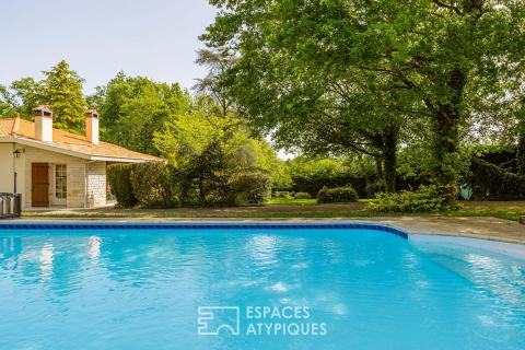 Maison de caractère des année 70 au coeur d&rsquo;un écrin de nature