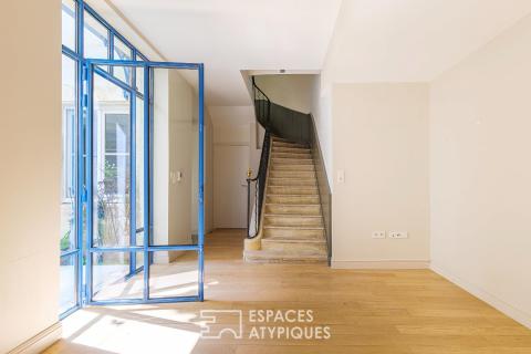 Triplex avec terrasses dans une bâtisse historique