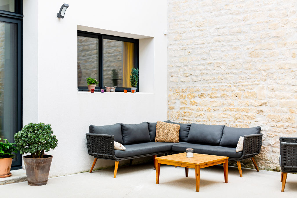 Chai en coeur de ville repensé en loft avec patio