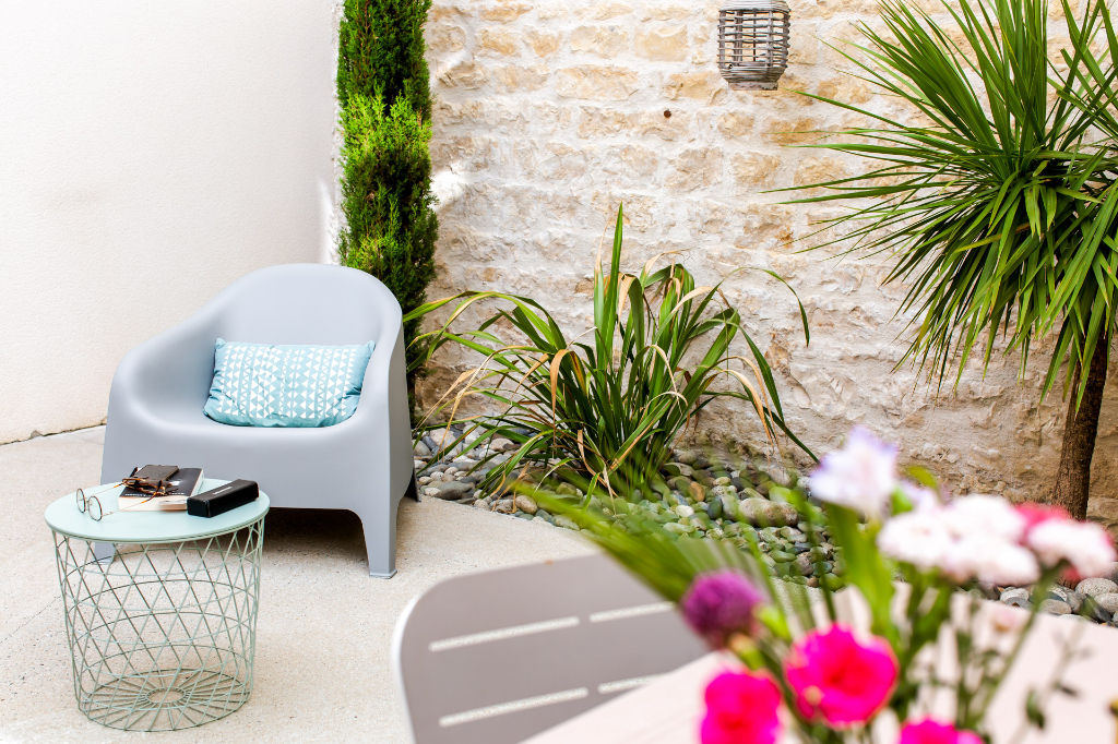 Chai en coeur de ville repensé en loft avec patio