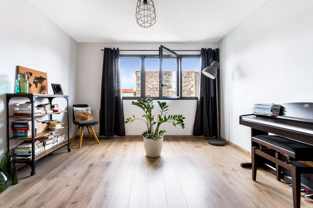 Chai en coeur de ville repensé en loft avec patio