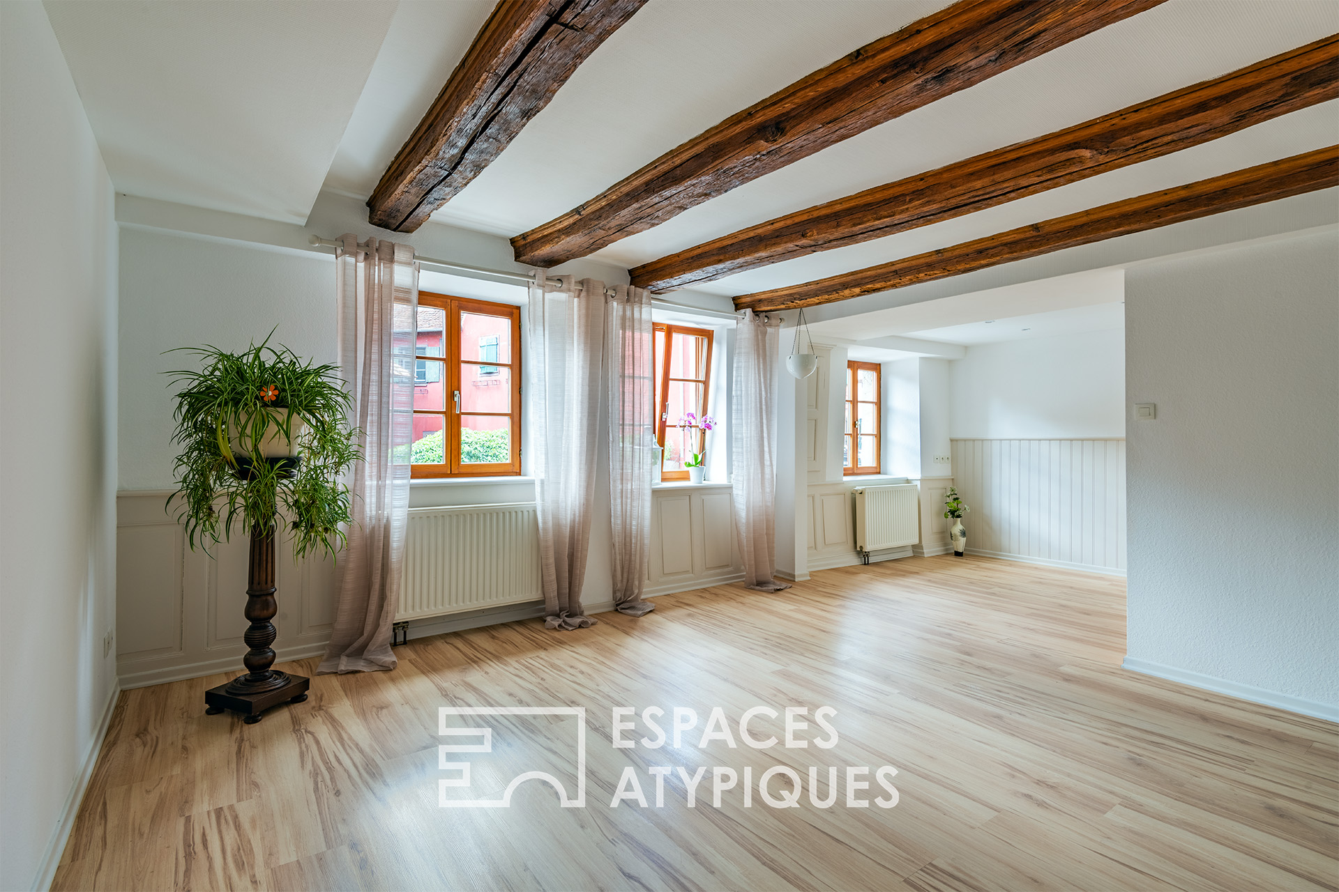 Renovated farmhouse leaning against the ramparts