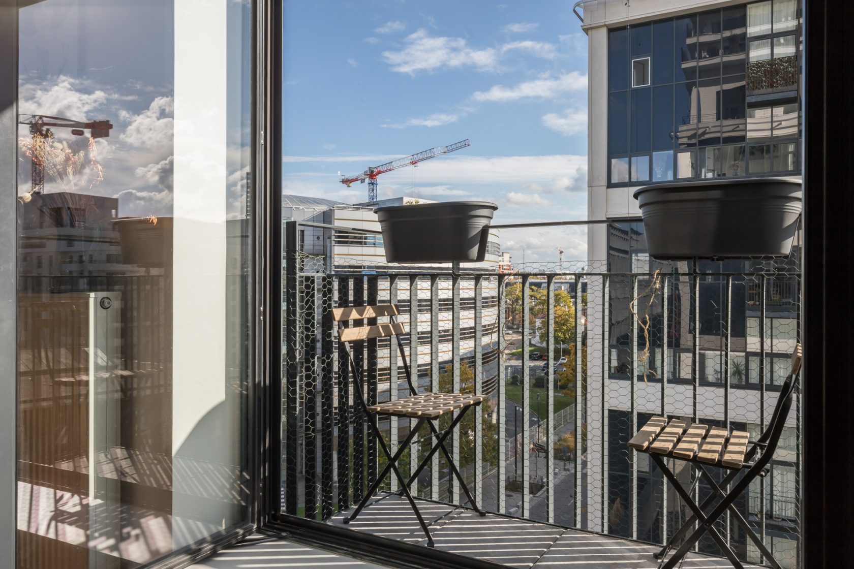 Duplex with glass roofs and balconies
