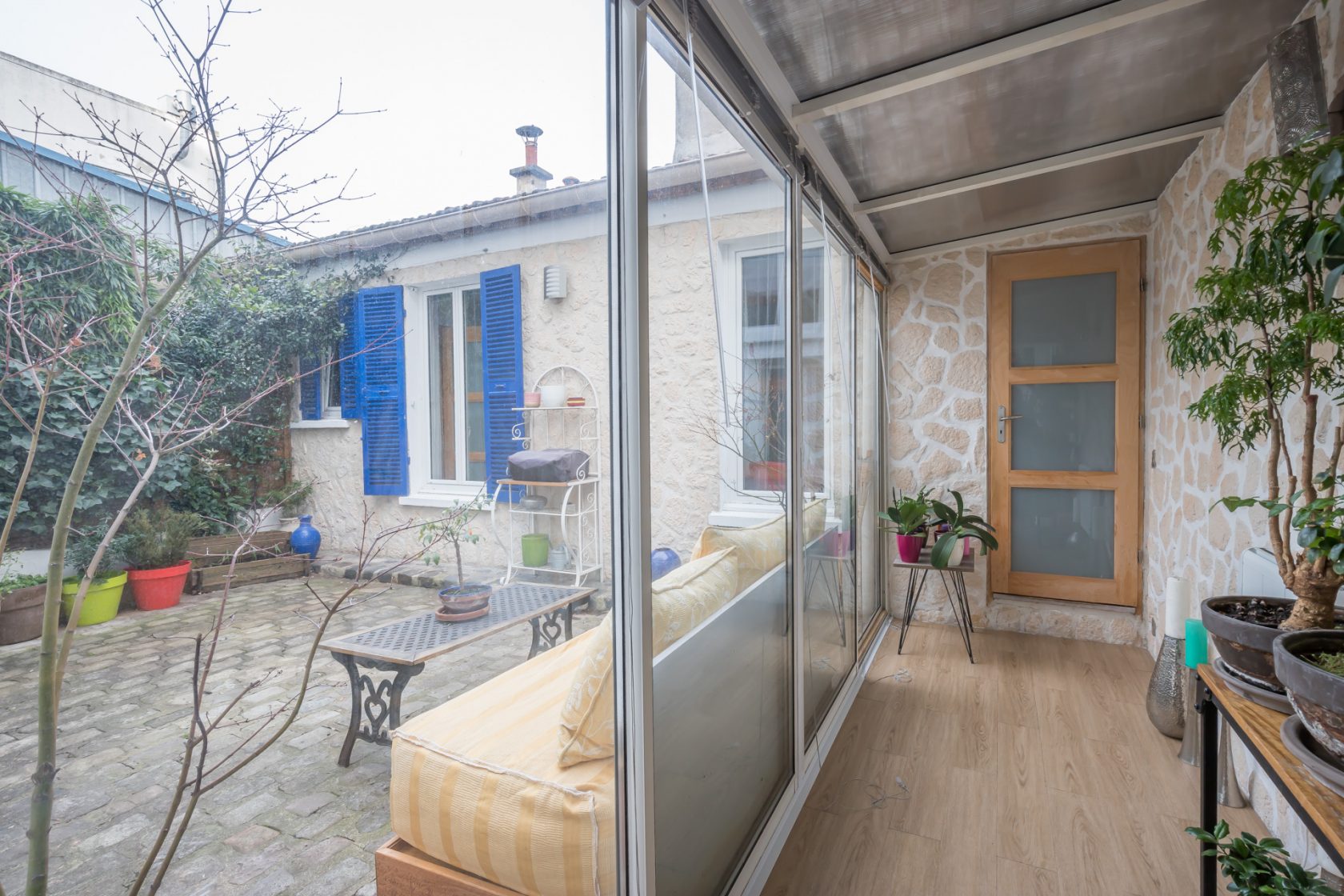 Loft house with paved courtyard